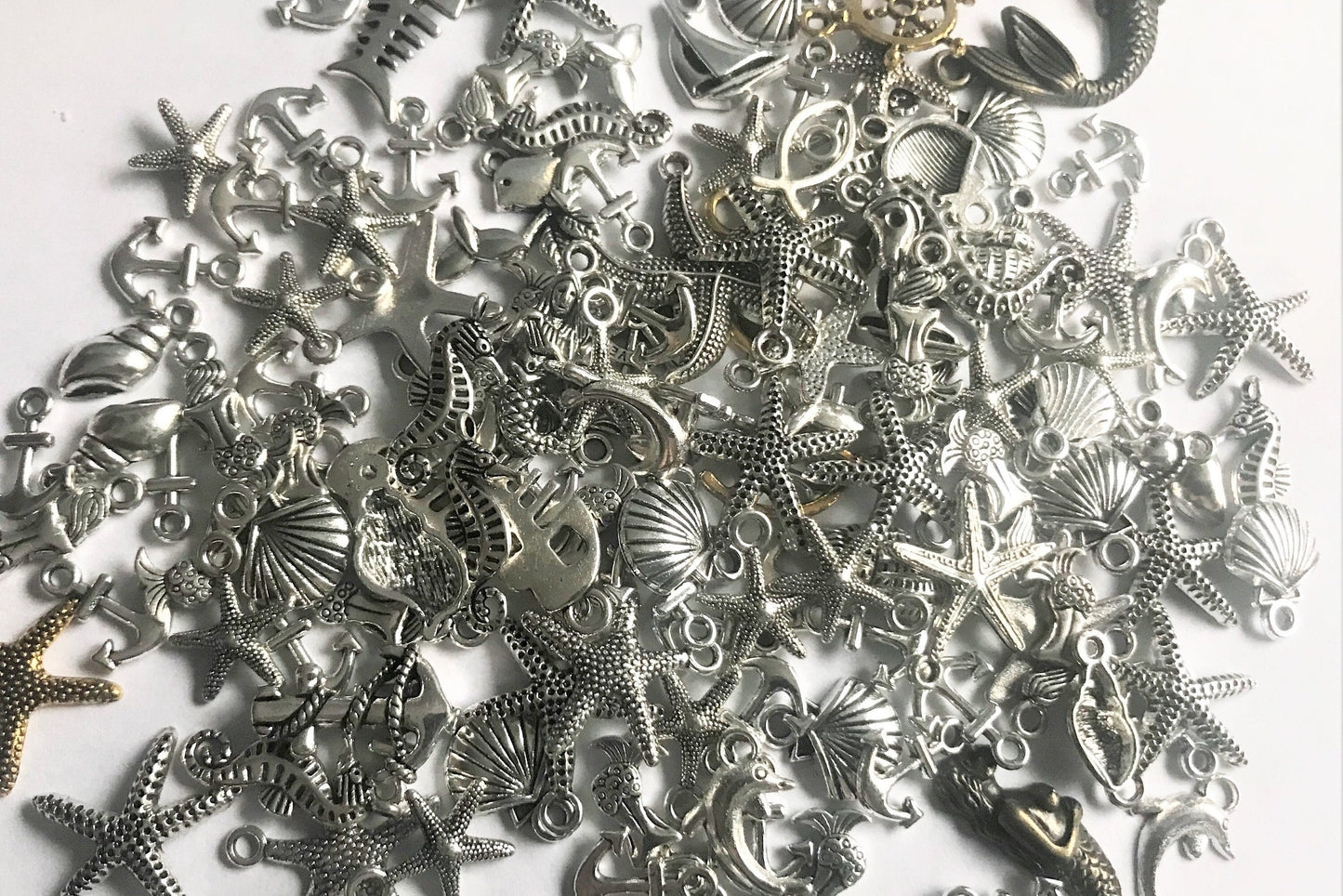 Ocean theme Nautical charms, sea theme charms , beach theme mix, includes mermaids, seahorses and anchors