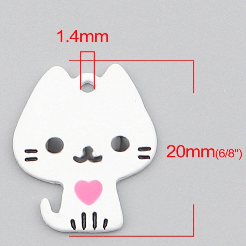 White cat charm. painted metal cat with heart, back is white