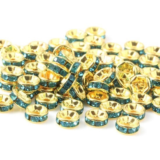 Rhinestone rondelle , 4mm gold plated spacer bead, blue crystal bead