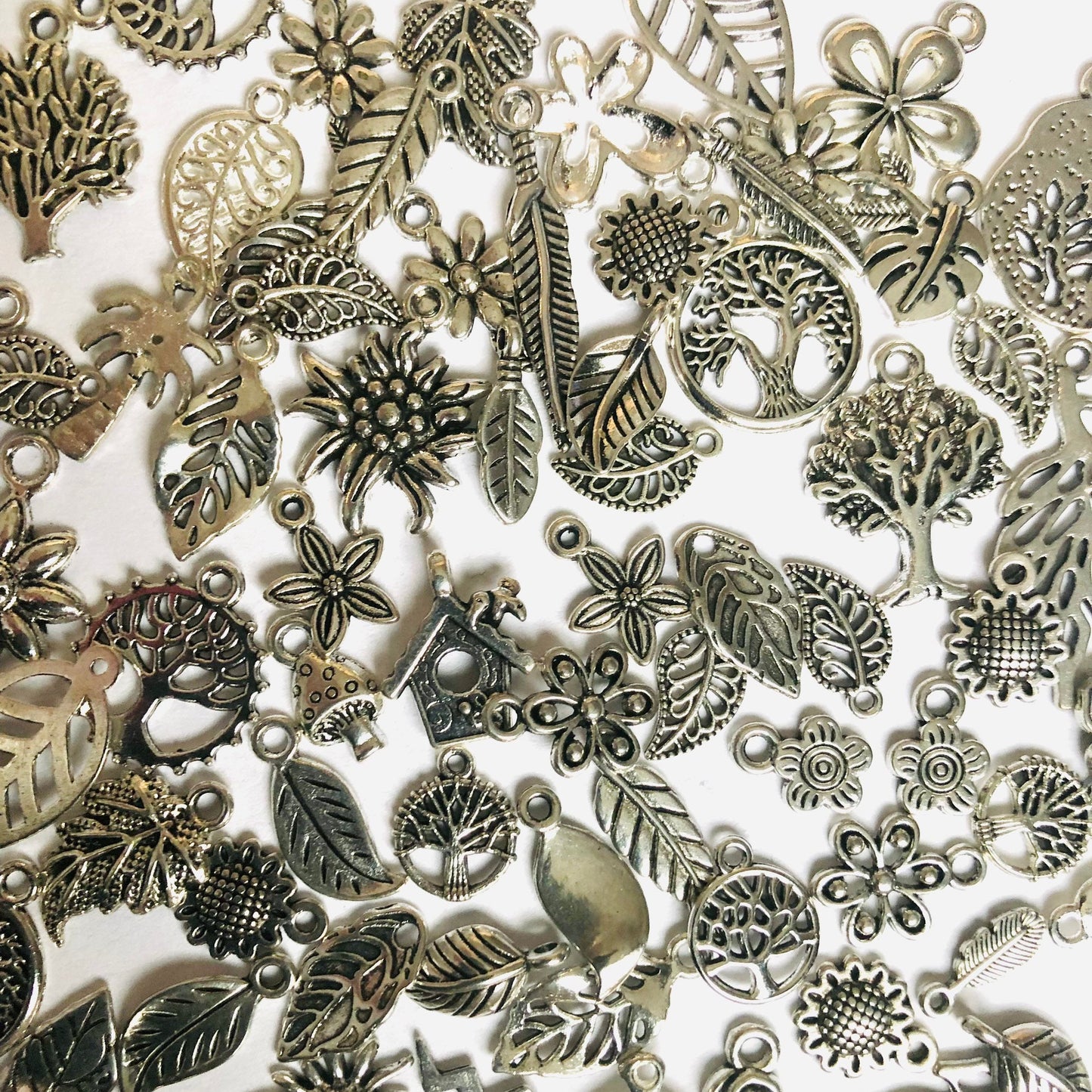 Nature charm mix, flower , tree and leaf charms in assorted sizes and styles bulk lot mixed lot