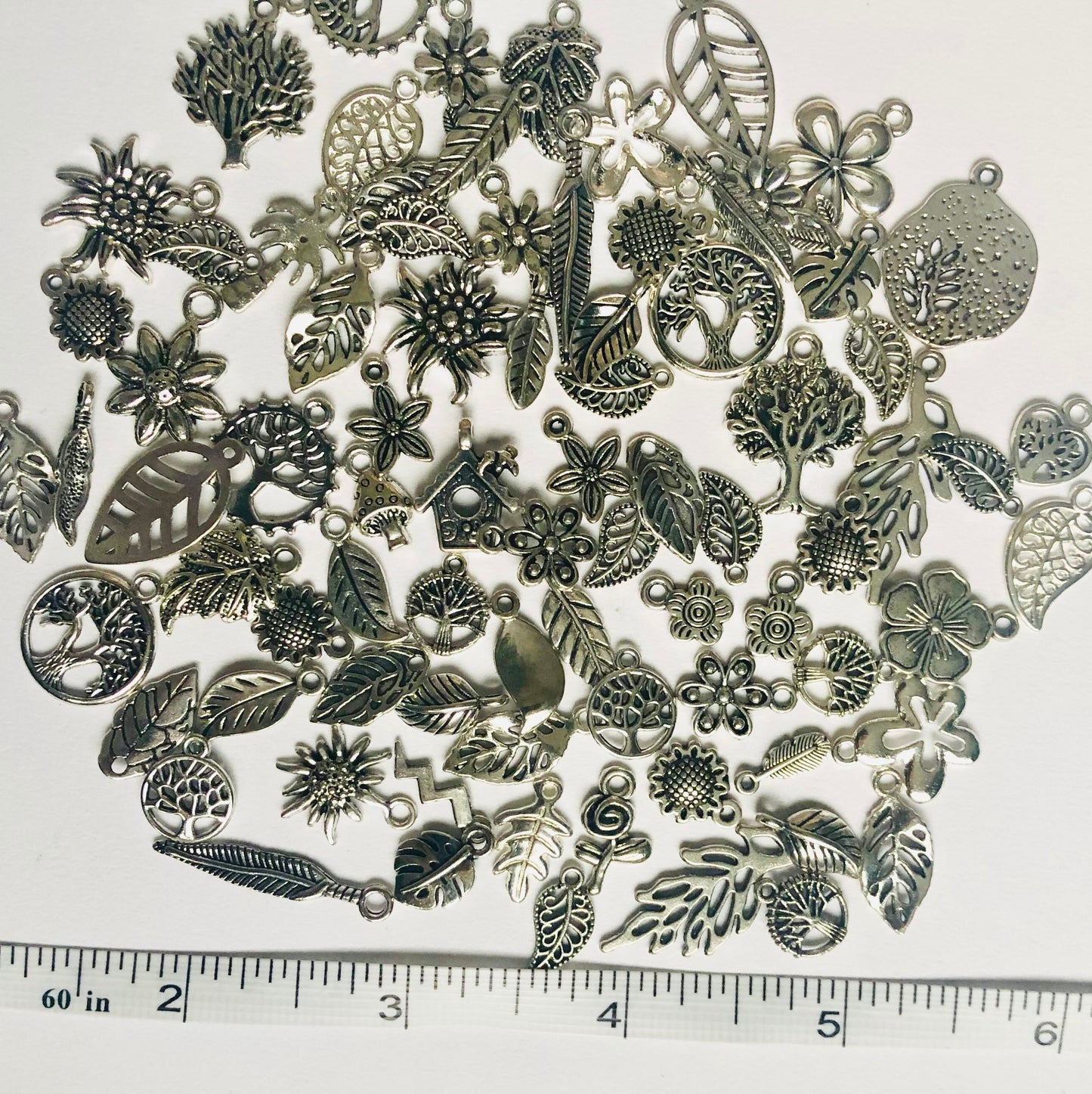 Nature charm mix, flower , tree and leaf charms in assorted sizes and styles bulk lot mixed lot