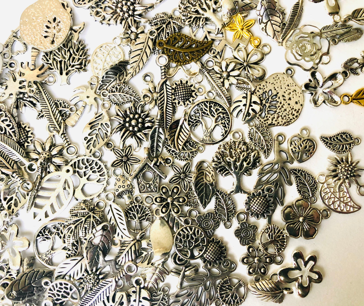 Nature charm mix, flower , tree and leaf charms in assorted sizes and styles bulk lot mixed lot