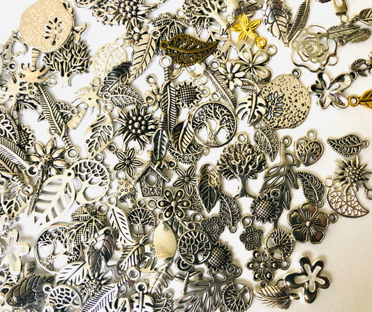 Nature charm mix,  flower , tree and leaf charms in assorted sizes and styles bulk lot mixed lot