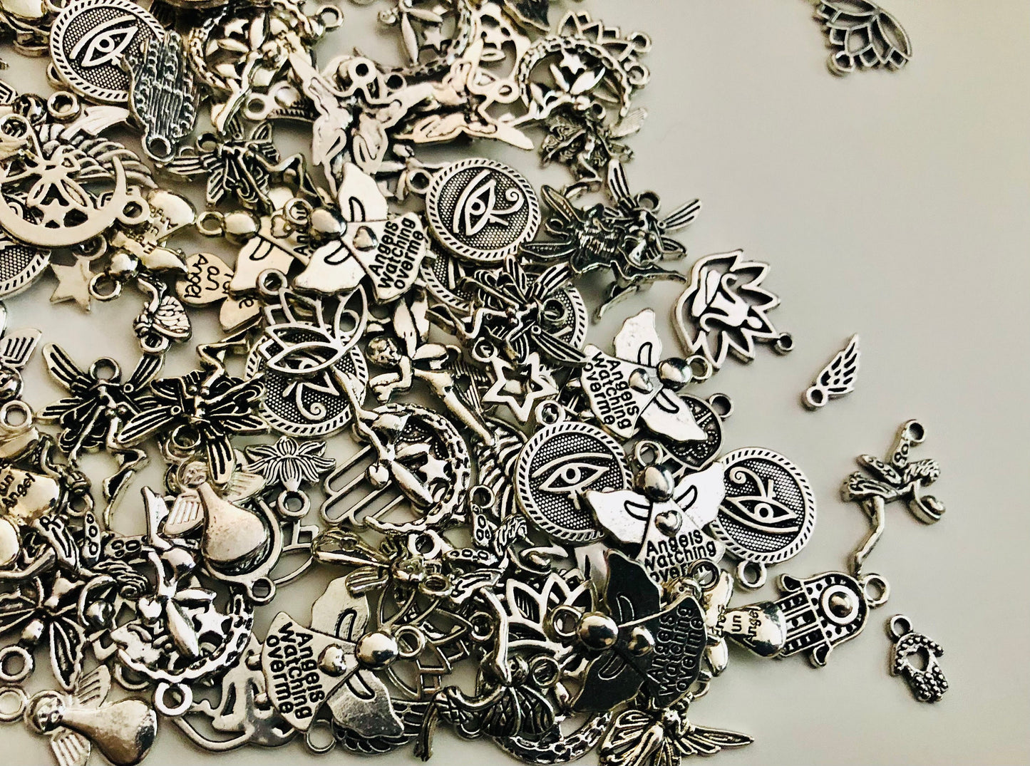 Fairy charm mix, spiritual charms, fairy and angel with evil eyes, hamsa and lotus flower charms