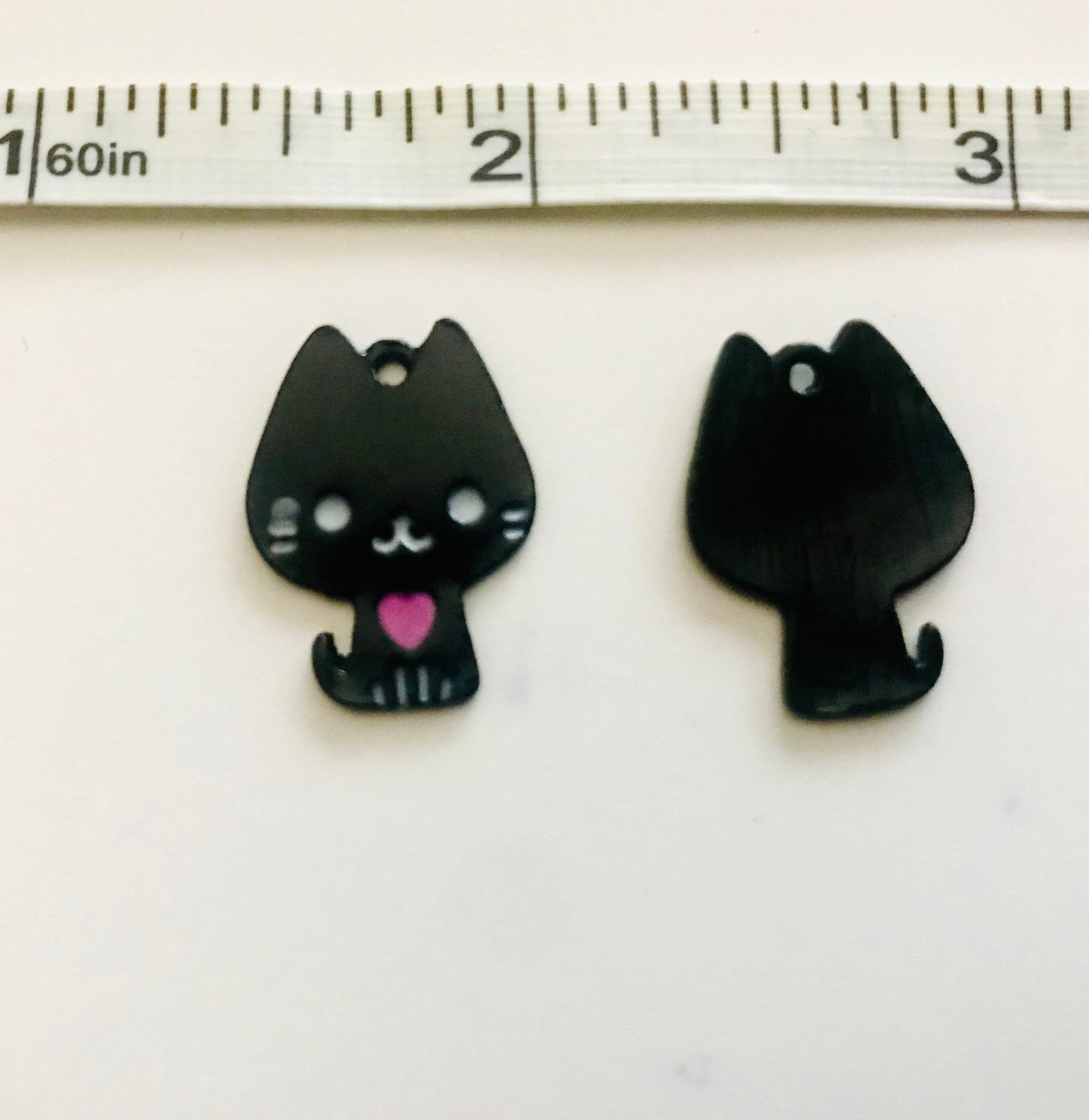 Black cat metal charm. painted charm with little heart, black backed charm, halloween black cat