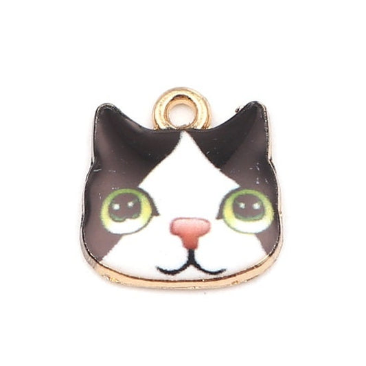 black cat face charm, enamel cat  with smiling face, green eye black and white cat , gold plated back