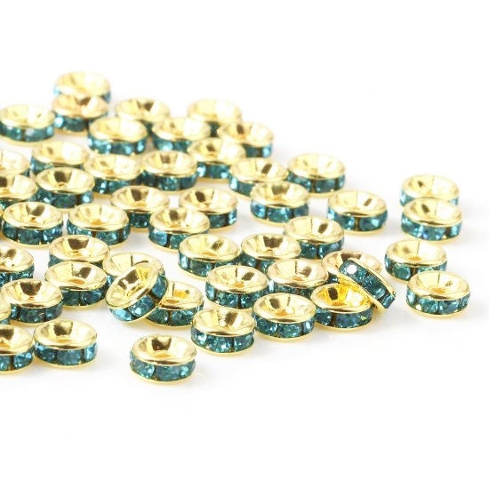 Rhinestone rondelle , 6mm gold  plated spacer bead, blue crystal bead