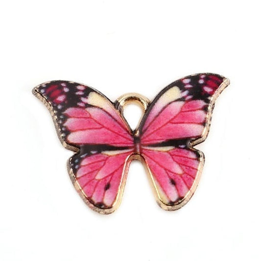 Pink butterfly charm. enamel  with black pattern charms enamel  gold backed charm