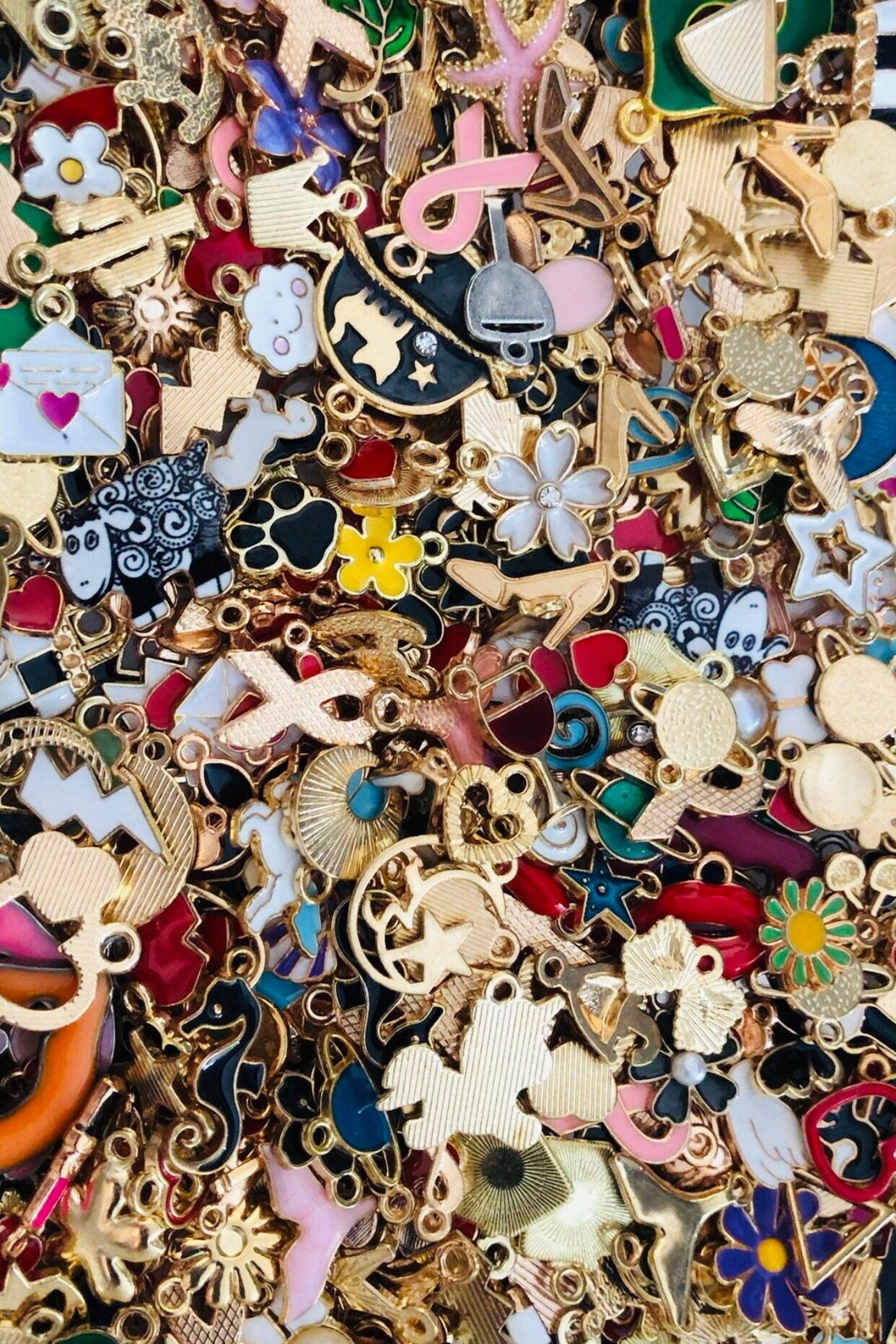 Mixed enamel charms, assorted bulk styles in a mix of colors and styles, new pieces added weekly