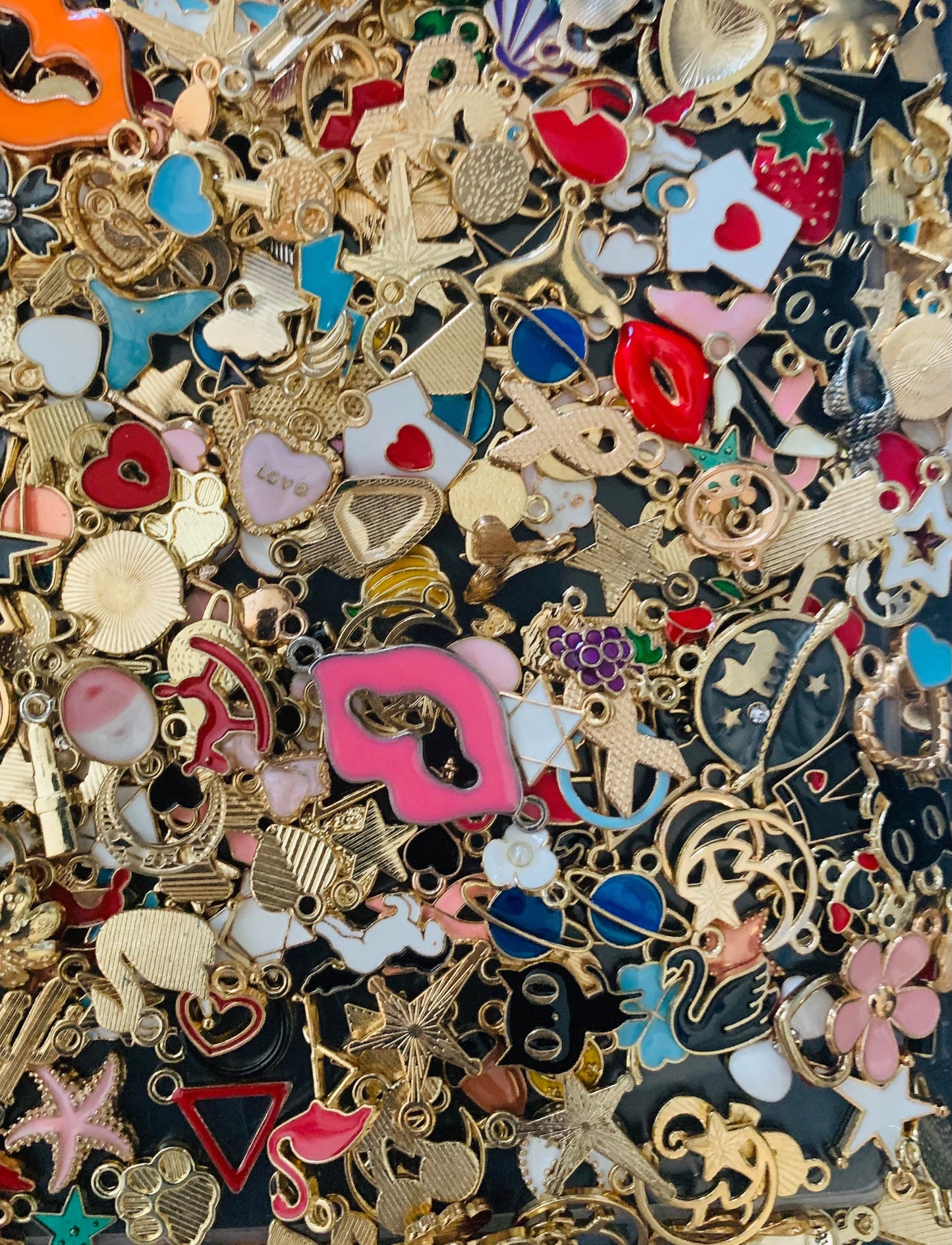 Mixed enamel charms, assorted bulk styles in a mix of colors and styles, new pieces added weekly