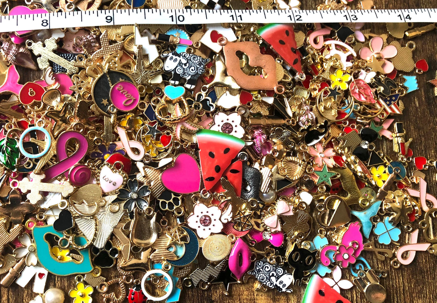 Mixed enamel charms, assorted bulk styles in a mix of colors and styles, new pieces added weekly