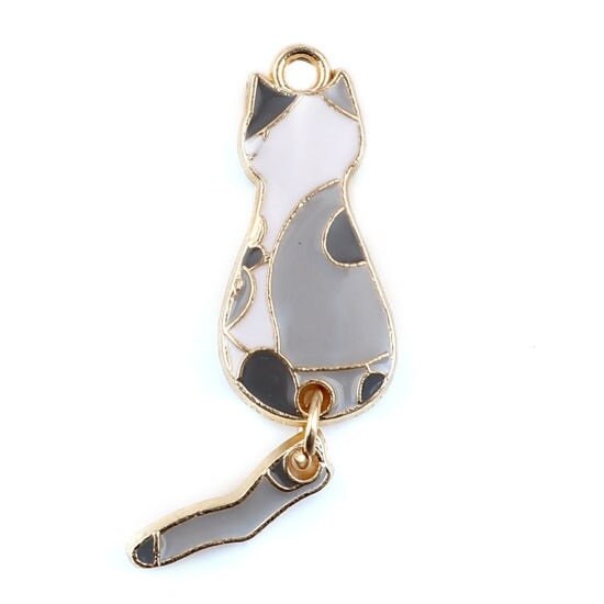 Grey cat with moveable tail dangle charm , enamel cat white with black spots with gold plated back