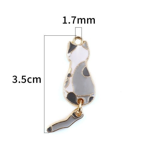 Grey cat with moveable tail dangle charm , enamel cat white with black spots with gold plated back